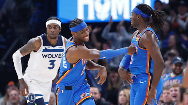 Shai Gilgeous-Alexander and Luguentz Dort celebrate